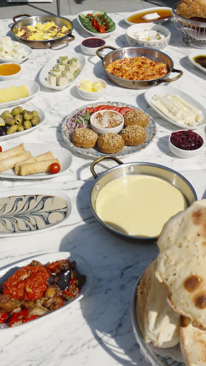A top-down breakfast spread on a white table